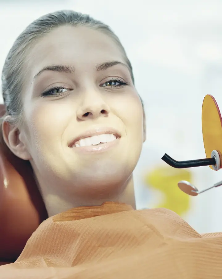 Patient in Centennial, Co receiving a dental filling