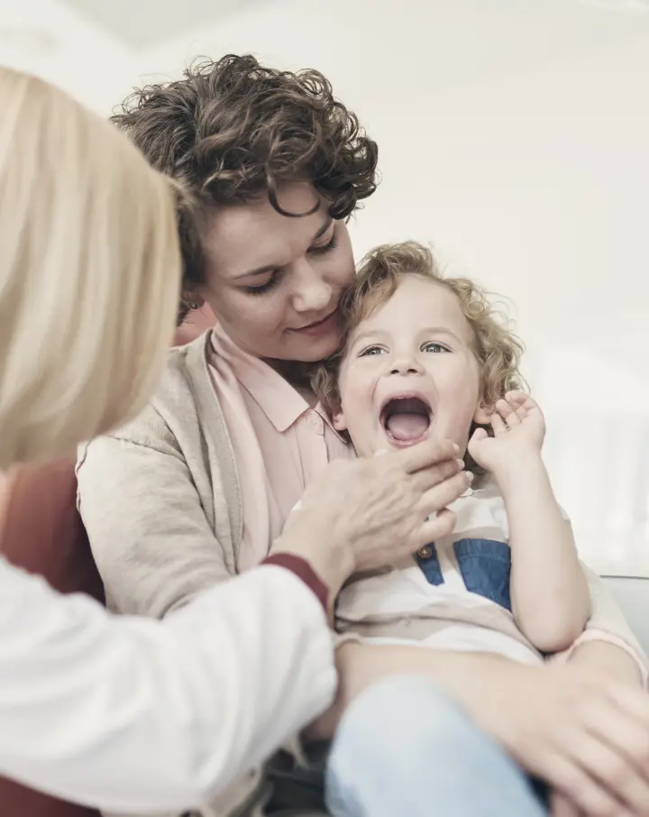 image of a family at a dental office